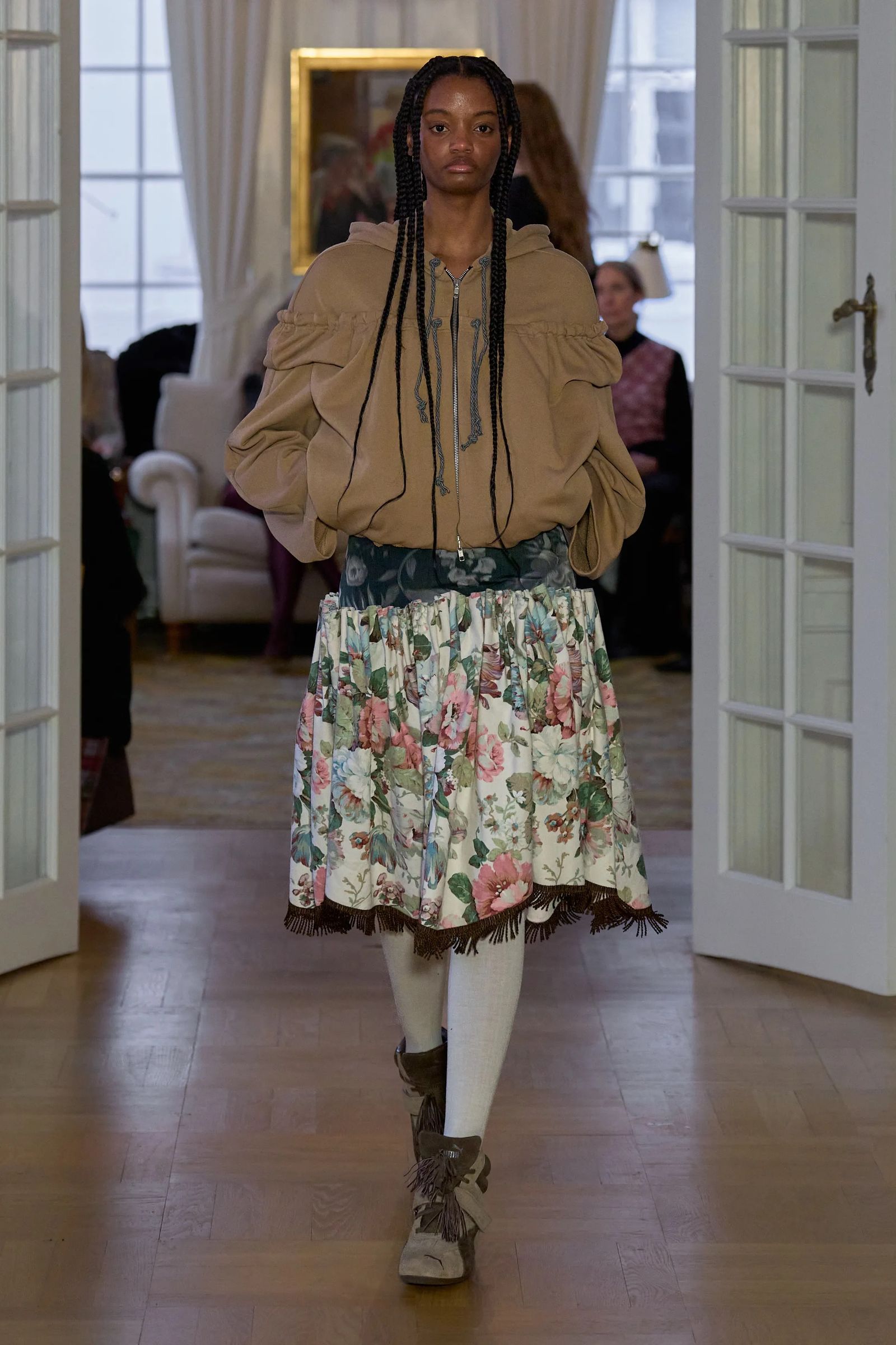 Image may contain Clothing Skirt Adult and Person