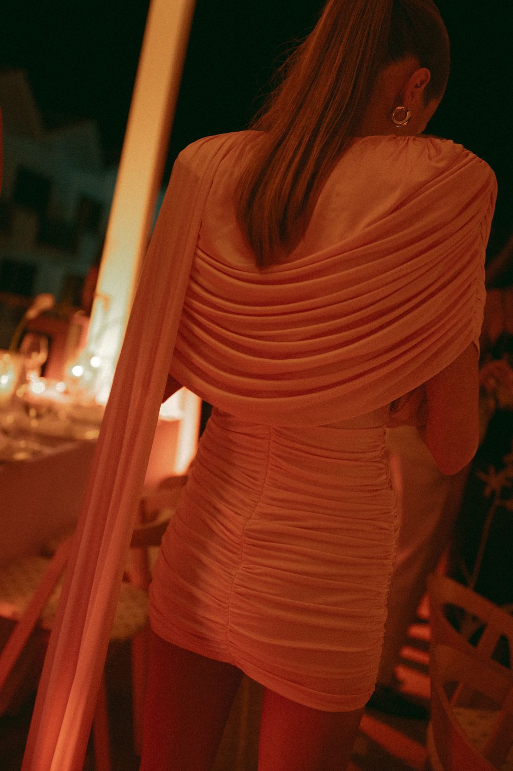 Image may contain Blouse Clothing Dress Adult Person Fashion and Formal Wear