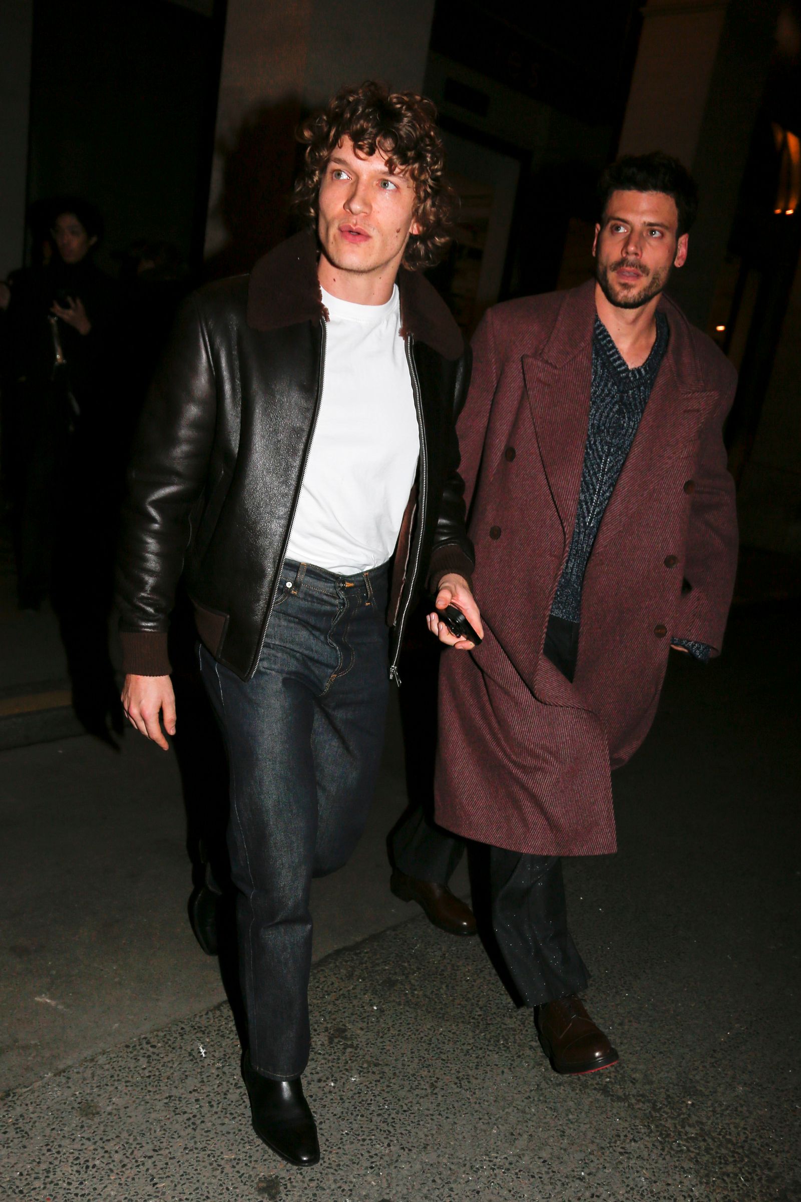 Image may contain Sylvain Tesson François Arnaud Clothing Coat Jacket Blazer Adult Person Pants Jeans and Face