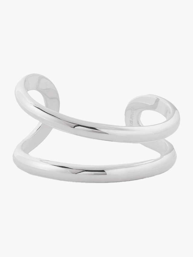 Image may contain Cuff Accessories Bracelet Jewelry and Smoke Pipe