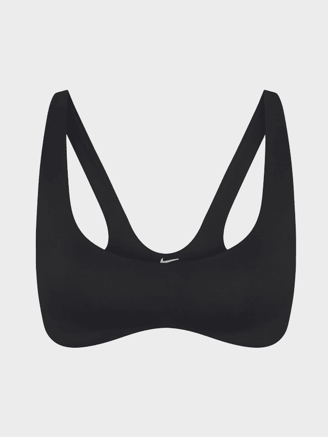 Image may contain: Accessories, Formal Wear, Tie, Smoke Pipe, Strap, Clothing, Swimwear, Bag, Handbag, and Cushion